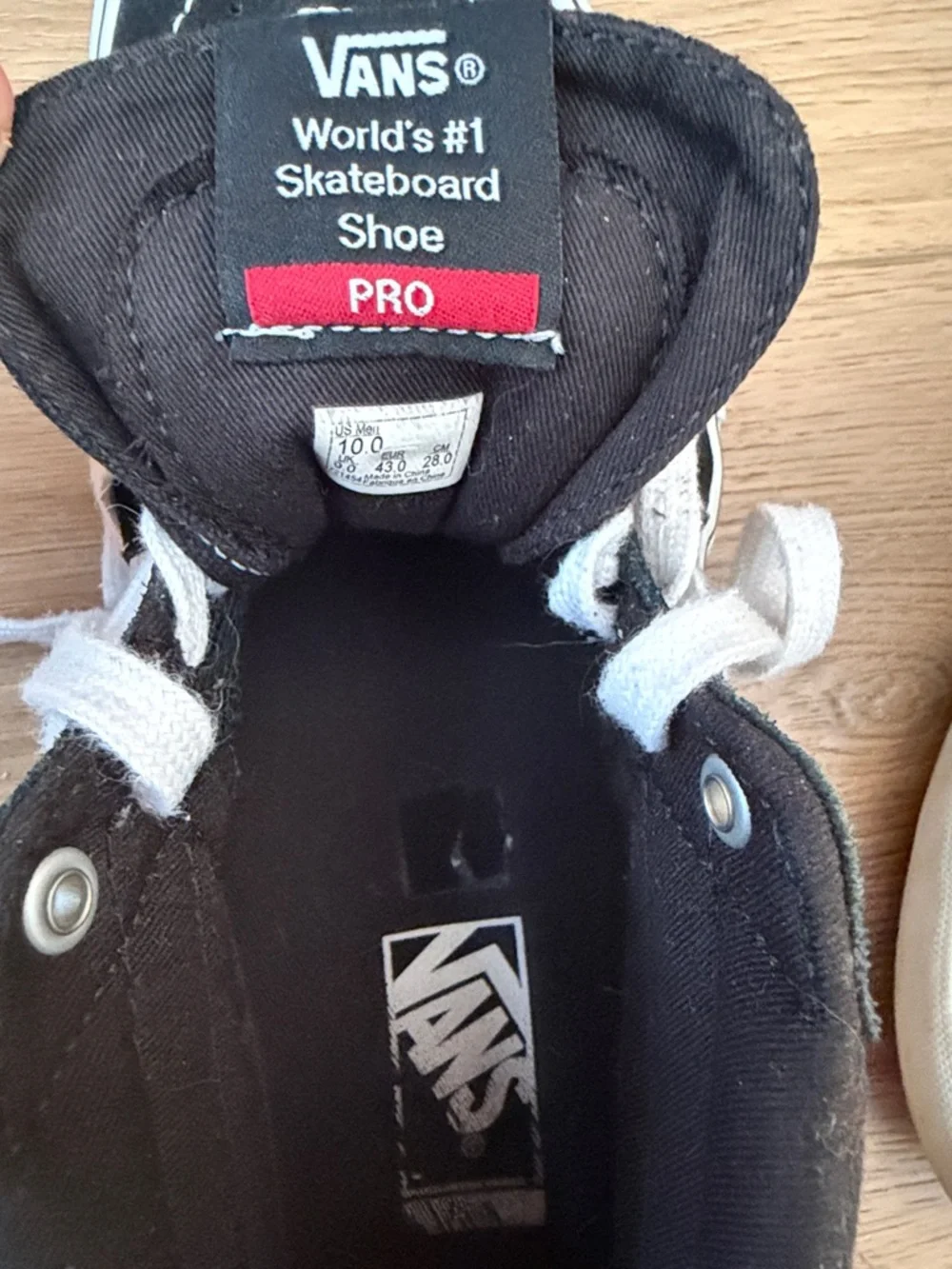 Vans Black & White Mid-Top Skate Sneakers